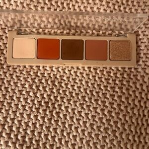 Natasha Denona Eyeshadow Palette with Cream, Orange, Brown, Tan, and Gold